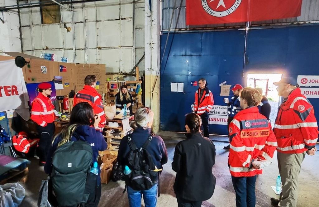 The Team Gets Instructions Before Driving Humanitarian Aid Into Ukraine